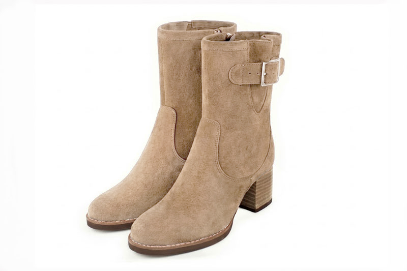 Classic leather ankle boots featuring adjustable side buckles and sleek hardware for secure support and timeless everyday style, in sand leather with round toe and mid block heel